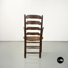 Load image into Gallery viewer, Wood and straw chair with armrests, late 1800s