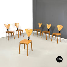 Load image into Gallery viewer, Wooden chairs with black metal bars, 1980s