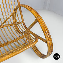 Load image into Gallery viewer, Rattan armchair with rounded armrests, 1970s
