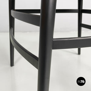 Chairs in black wood and brown leather, 1980s