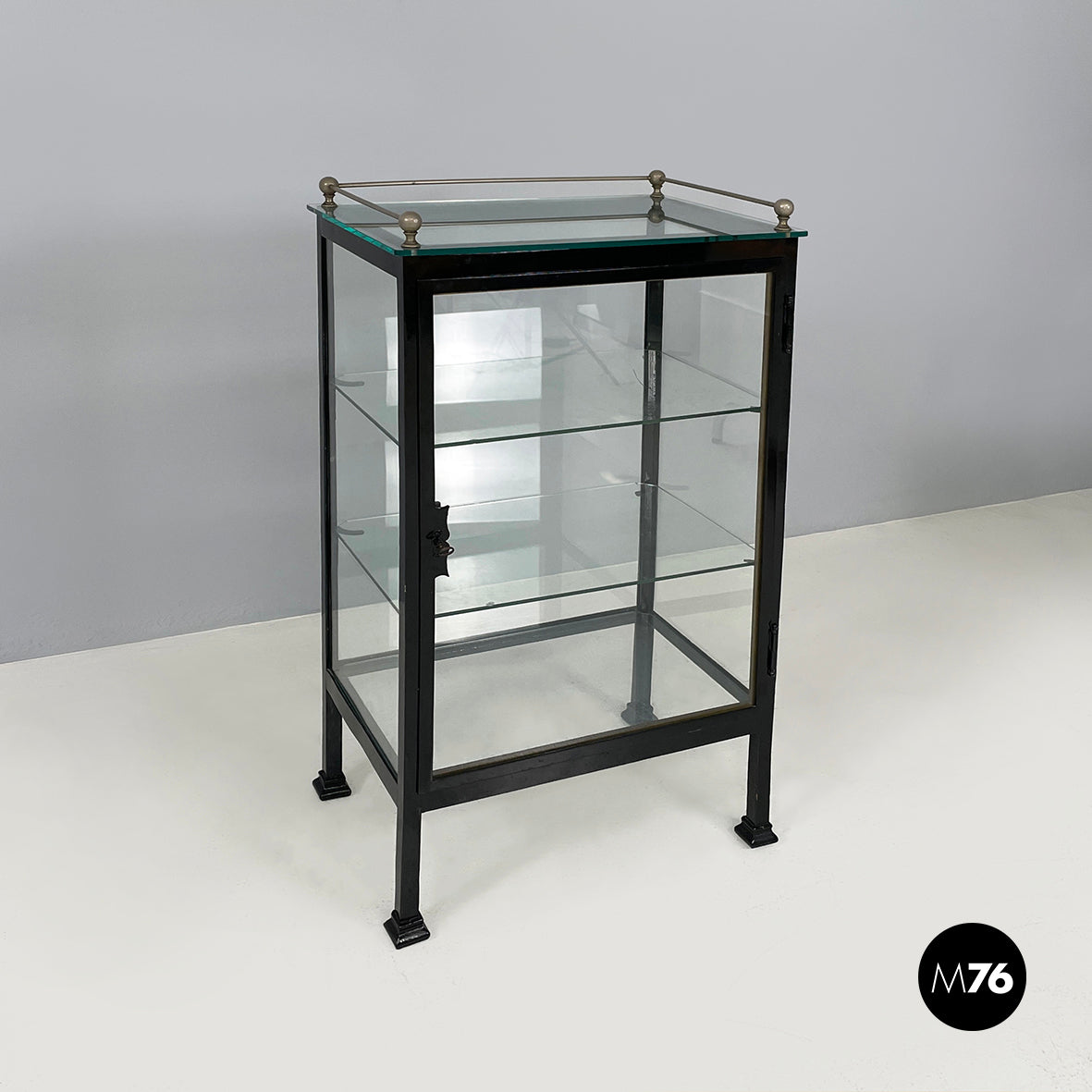 Display cabinet in glass and black metal early 1900s
