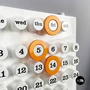 Orange rings for the perpetual wall calendar by Ring A Date, 2020s