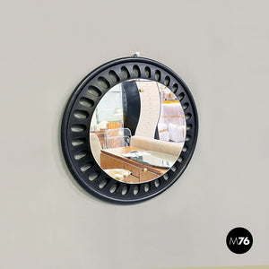 Round wall mirror in black wood, 20th century