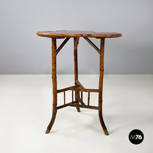 Coffee table with red wood clover top and bamboo, 1900-1950s
