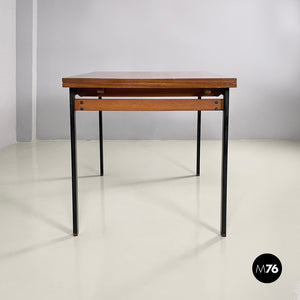 Extendable dining table in wood and black metal, 1960s