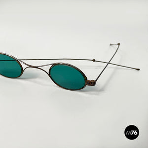 Sunglasses in green glass and metal, mid 1900s