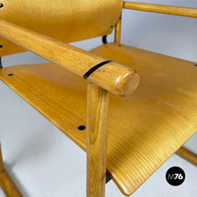 Load image into Gallery viewer, Chairs with armrests in wood and black metal, 1970s
