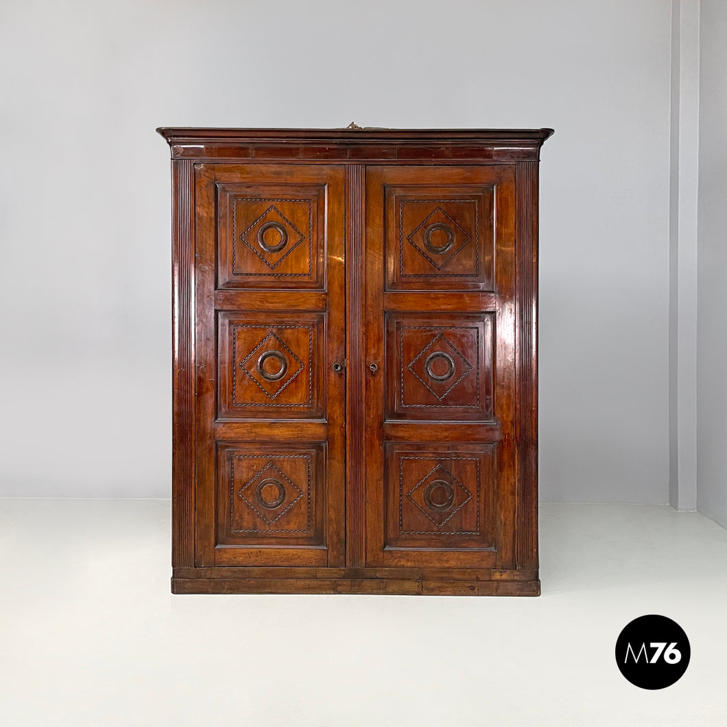 Two-door wooden wardrobe with decorations, early 1800s