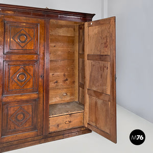 Two-door wooden wardrobe with decorations, early 1800s