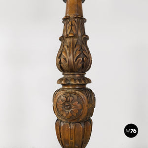 Carved wood and yellow fabric floor lamps or torch holders, 1500