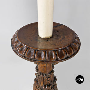 Carved wood and yellow fabric floor lamps or torch holders, 1500