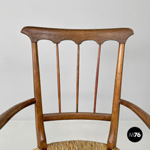 Load image into Gallery viewer, Armchairs in wood and straw with brass feet, 1950s
