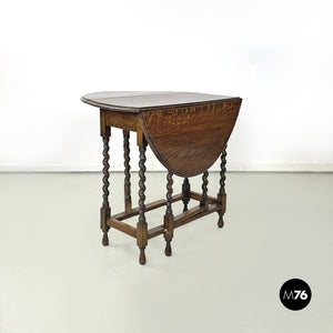 Wooden coffee or service table with folding top, 1900s