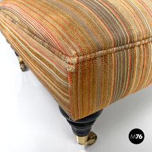 Load image into Gallery viewer, Pouf on wheels with orange and yellow striped fabric, 1970s
