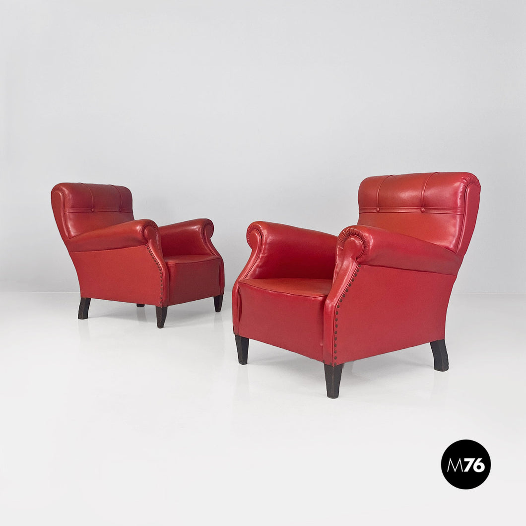 Red leather armchairs with armrests and wooden legs, 1940s