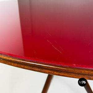 Red back painted glass and wood round dining table, 1950s