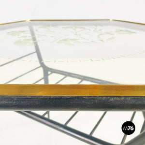 Decorated glass and metal coffee table with magazine rack, 1950s