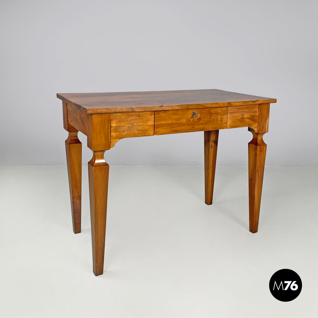 Wooden desk with drawer and decorated legs, late 1800s