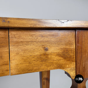 Wooden desk with drawer and decorated legs, late 1800s