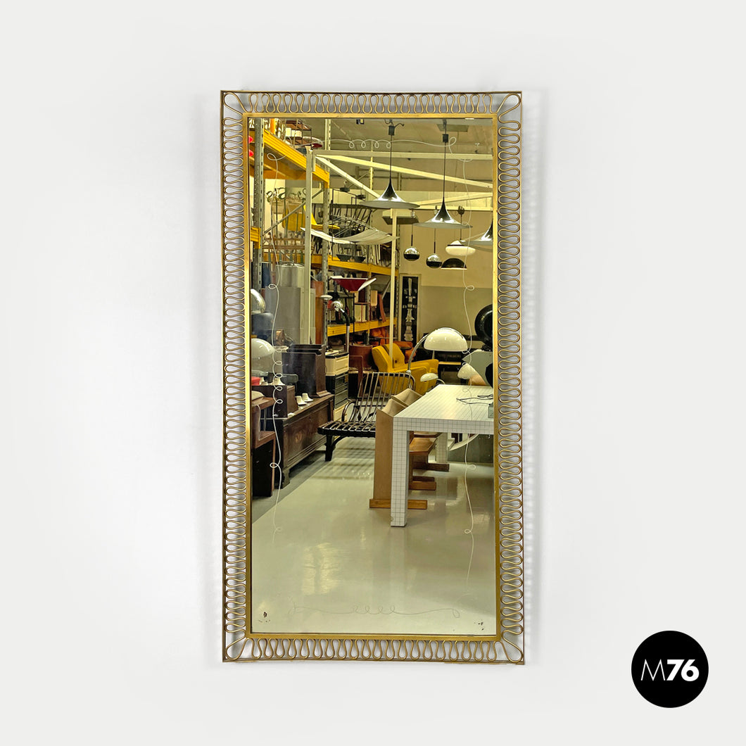 Brass wall mirror with swirl decorated frame, 1940s