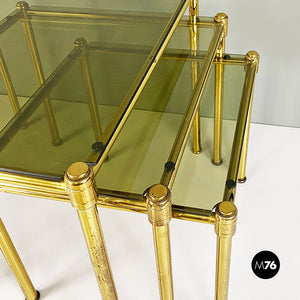 Brass and smoked glass trio of coffee tables, 1970s