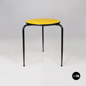 Round yellow laminate and black metal bar table, 1950s