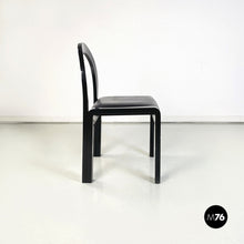 Load image into Gallery viewer, Chairs in black lacquered wood and black leather, 1980s

