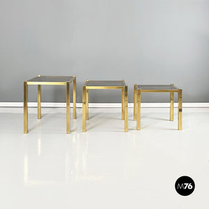 Coffe tables in brass and smoked glass, 1970s