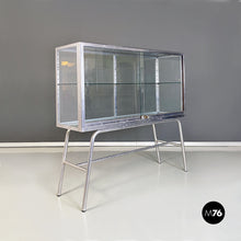 Load image into Gallery viewer, Aluminium and glass pharmacy vitrin with internal shelf, 1950s
