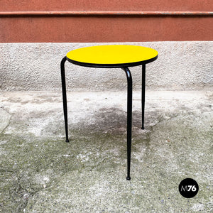 Round yellow laminate and black metal bar table, 1950s