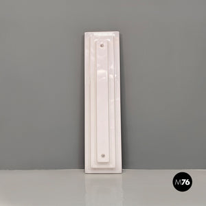 Sculptural stepped profile white plexiglass and metal wall lamp, 1970s