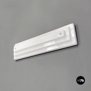 Sculptural stepped profile white plexiglass and metal wall lamp, 1970s