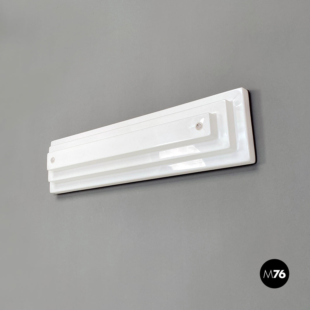 Sculptural stepped profile white plexiglass and metal wall lamp, 1970s